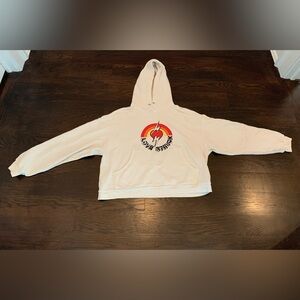 Re/Done Originals Women’s size small white hoodie with red heart logo.